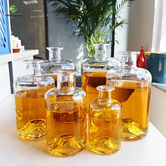 700ml 750ml Custom Round Glass Clear Whiskey Tequlia Glass Bottle with Cork 